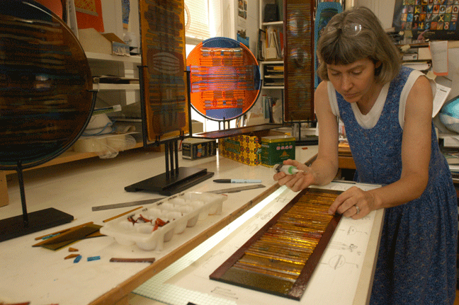 Lynn Latimer's fused glass panels are made of multiple layers of translucent Lynn Latimer's fused glass panels are made of multiple layers of translucent